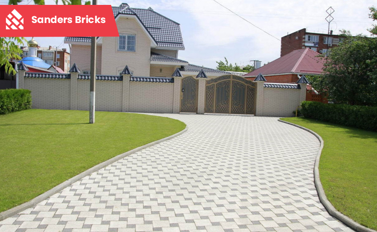 Close-up of decorative stamped asphalt pattern on driveway